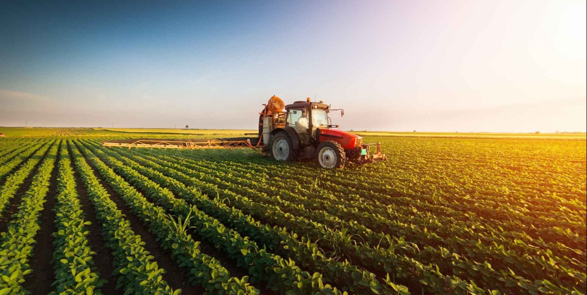 A tractor mowing a field.